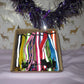 Box of 12 high visibility cat collars in multiple colours