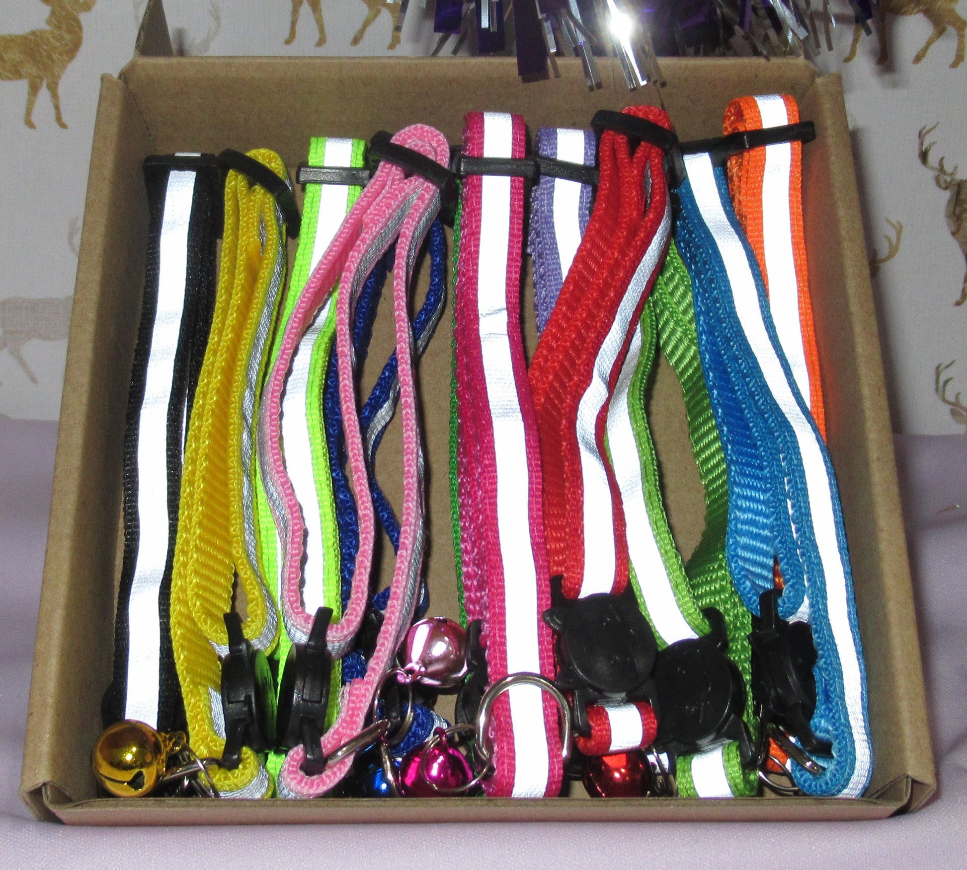 Box of 12 high visibility cat collars in multiple colours 